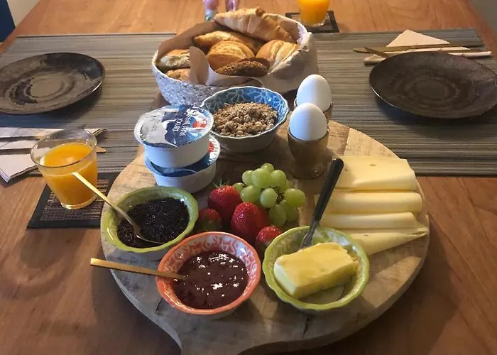 Het Opgemaakte Bed